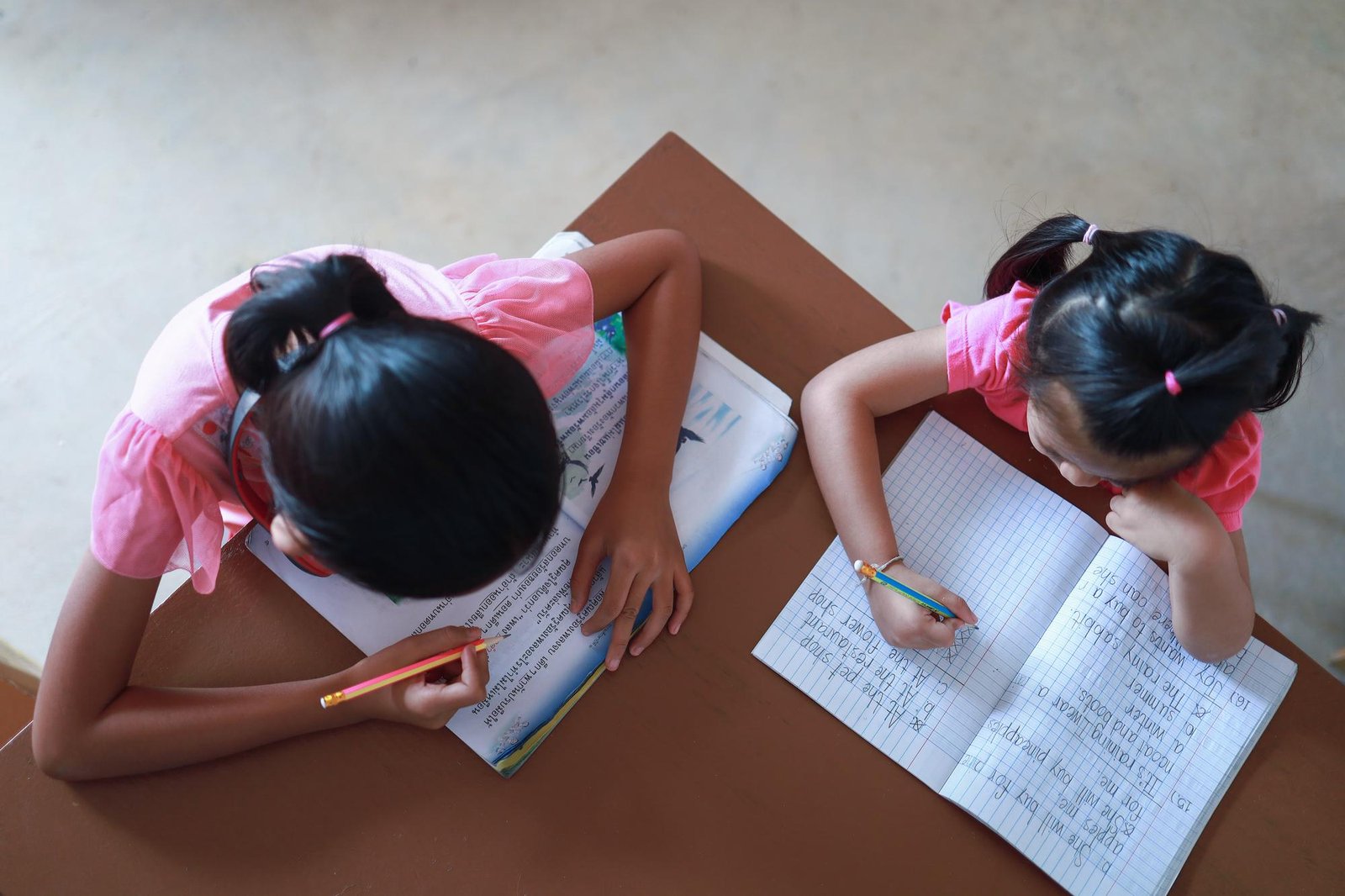 Teacher explaining a concept on the board